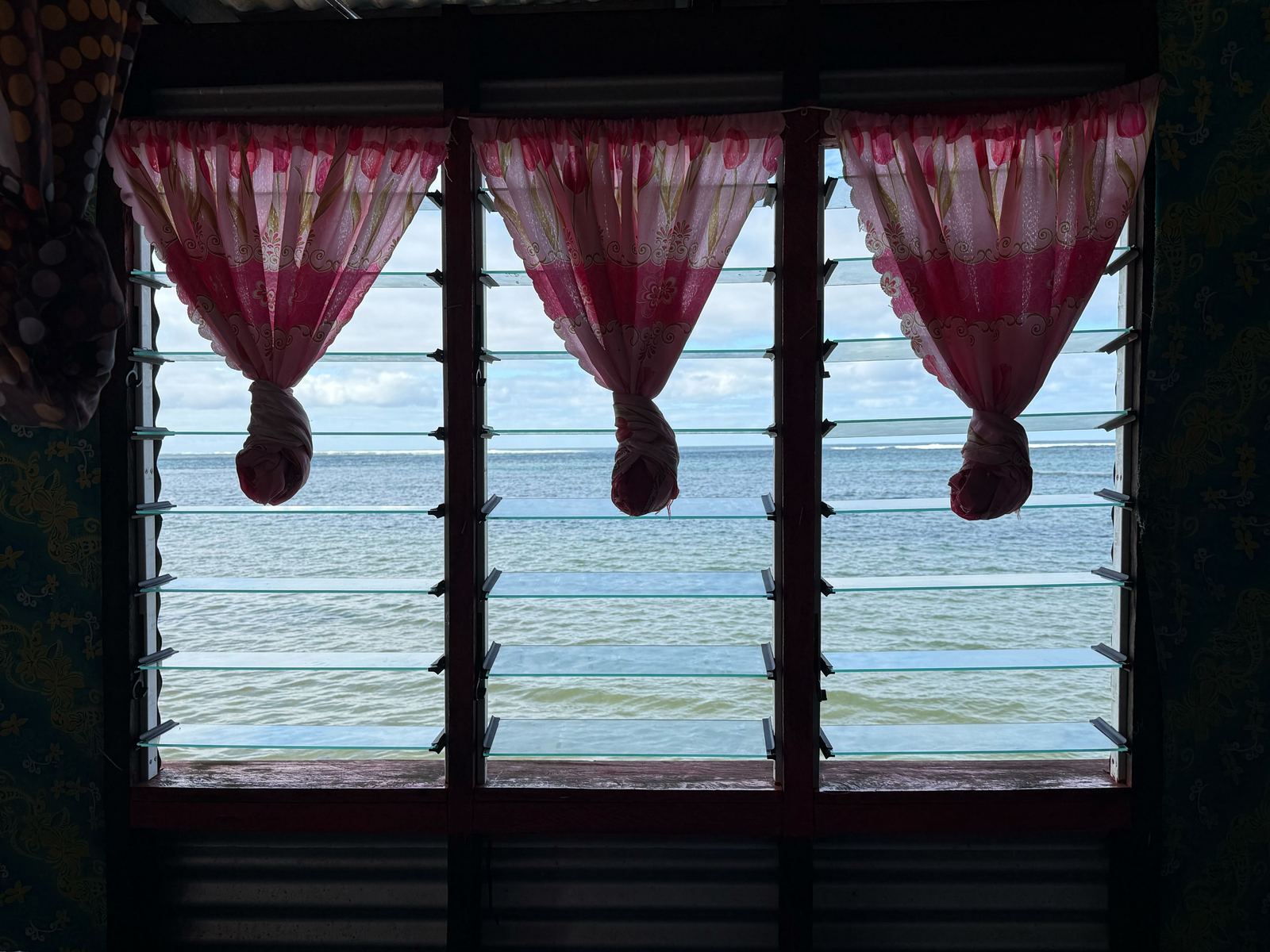 Louvre windows with ocean view
