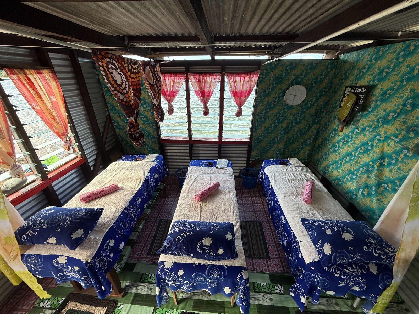 Inside the hut — colourful fabrics