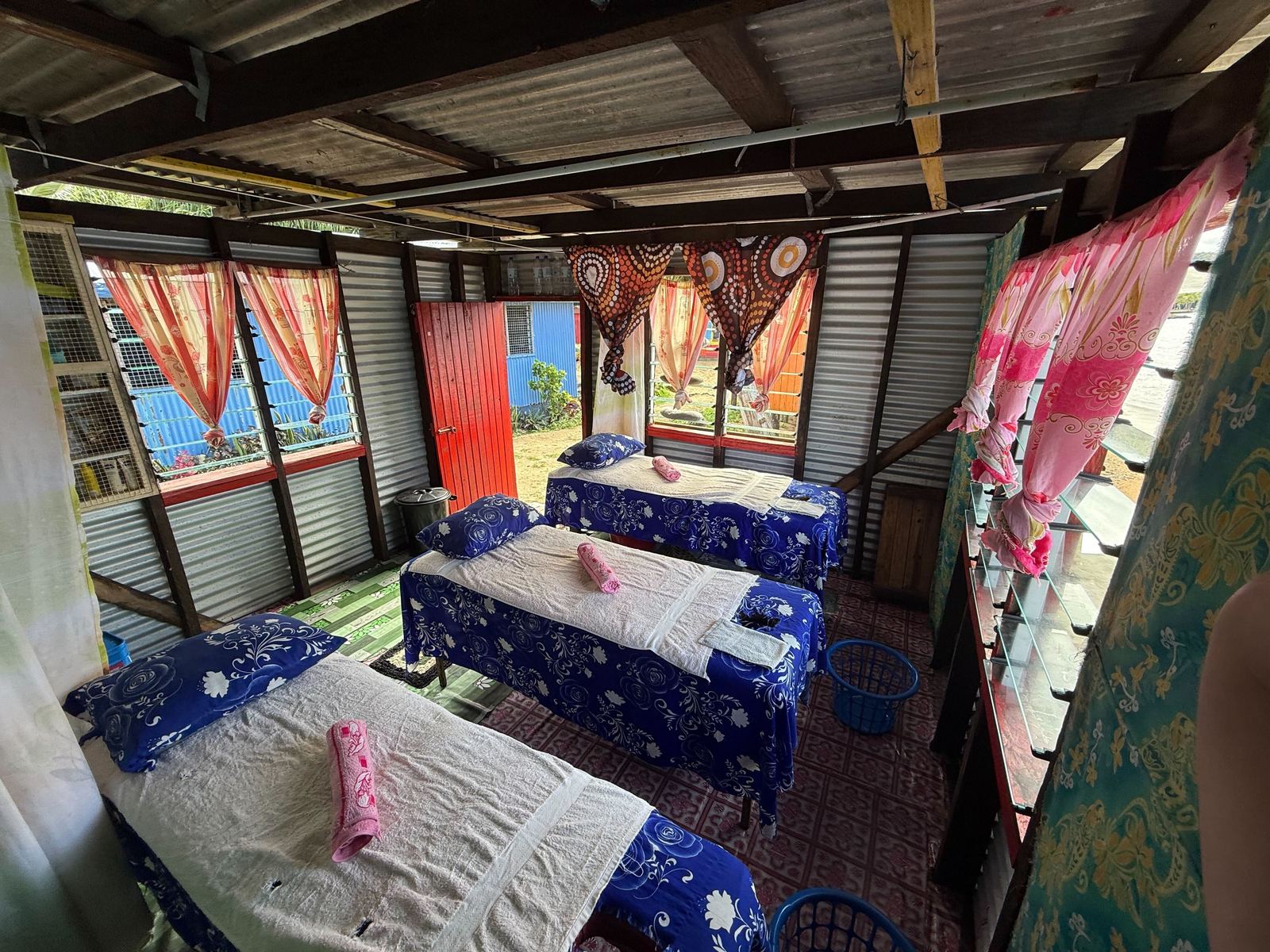 Massage beds inside the hut